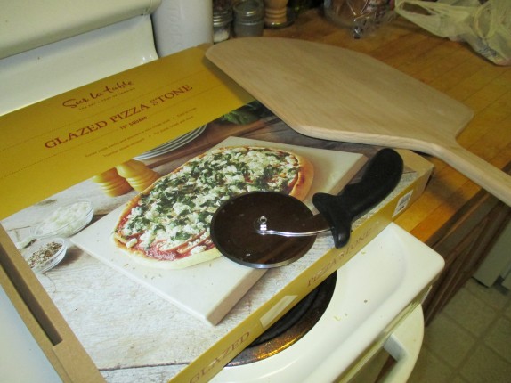 Pizza stone, peel, and circular cutter