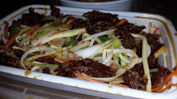 Crispy Shredded Beef in Spicy Sauce $12 - Steak coated in carrot, bean sprouts, celery and scallion batter fried crispy and quickly tossed in a spicy sauce