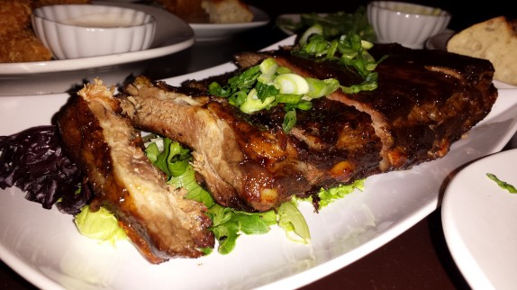 BBQ Dry Rubbed House Smoked St. Louis Ribs, white peach bourbon BBQ sauce - $8